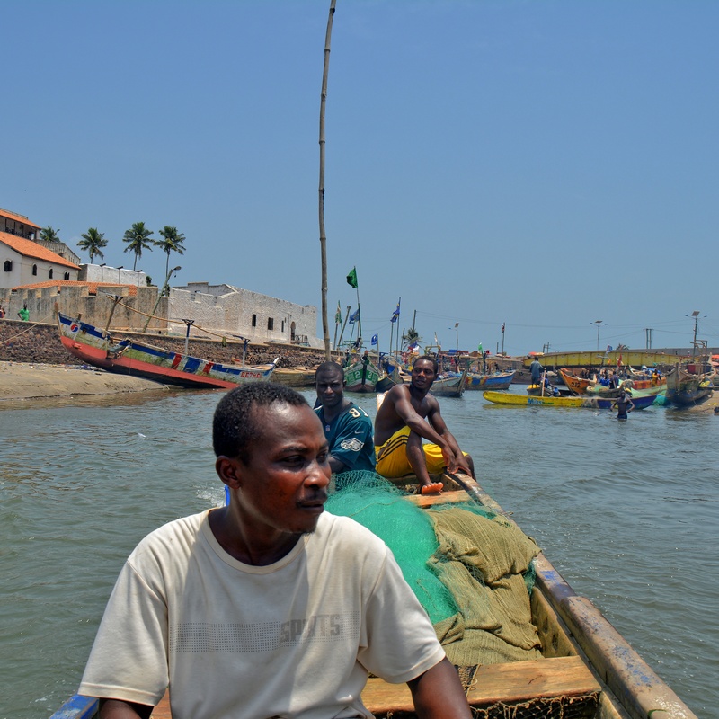 At Elmina fishing boat and Elmina Castle © Remo Kurka